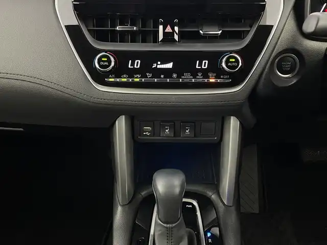 トヨタ カローラ クロス Z 新潟県 2021(令3)年 1.2万km プラチナホワイトパールマイカ ワンオーナー/衝突被害軽減ブレーキ/レーンキープアシスト/ブラインドスポットモニター/パノラマルーフ/純正ナビ/　（BT/USB/AM/FM）/全周囲カメラ/レーダークルーズコントロール/LEDオートライト/ハーフレザーシート/パワーシート/シートヒーター/純正18インチアルミホイール/ステアリングスイッチ/USBポート/スマートキー/ビルトインETC