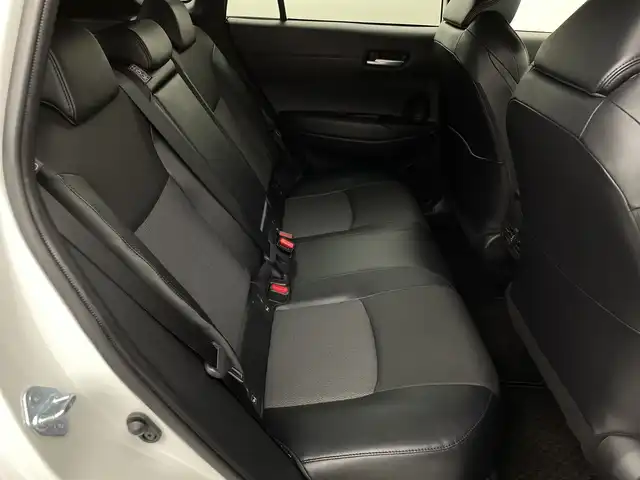 トヨタ カローラ クロス Z 新潟県 2021(令3)年 1.2万km プラチナホワイトパールマイカ ワンオーナー/衝突被害軽減ブレーキ/レーンキープアシスト/ブラインドスポットモニター/パノラマルーフ/純正ナビ/　（BT/USB/AM/FM）/全周囲カメラ/レーダークルーズコントロール/LEDオートライト/ハーフレザーシート/パワーシート/シートヒーター/純正18インチアルミホイール/ステアリングスイッチ/USBポート/スマートキー/ビルトインETC