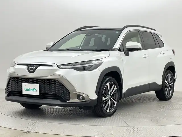 トヨタ カローラ クロス Z 新潟県 2021(令3)年 1.2万km プラチナホワイトパールマイカ ワンオーナー/衝突被害軽減ブレーキ/レーンキープアシスト/ブラインドスポットモニター/パノラマルーフ/純正ナビ/　（BT/USB/AM/FM）/全周囲カメラ/レーダークルーズコントロール/LEDオートライト/ハーフレザーシート/パワーシート/シートヒーター/純正18インチアルミホイール/ステアリングスイッチ/USBポート/スマートキー/ビルトインETC