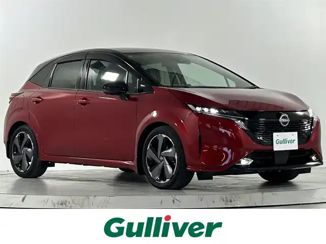 日産 オーラ G 佐賀県 2021(令3)年 6.5万km ガーネットレッド/スーパーブラック 2トーン 純正9インチナビ/フルセグTV/Bluetooth/androidauto/Applecarplay/全方位カメラ/BOSEプレミアムサウンド/BOSEスピーカー内蔵ヘッドレスト/デジタルインナールームミラー/衝突被害軽減システム/プロパイロット/レーダークルーズコントロール/レーンアシスト/ブラインドスポットモニター/ロードサインアシスト/クリアランスソナー/オートライト/オートマチックハイビーム/LEDヘッドライト/LEDフォグライト/電子パーキング/オートブレーキホールド/前方ドライブレコーダー/ハーフレザーシート/ISOFIX対応シート/置くだけ充電/純正フロアマット/純正17インチアルミホイール/スマートキー/プッシュスタート