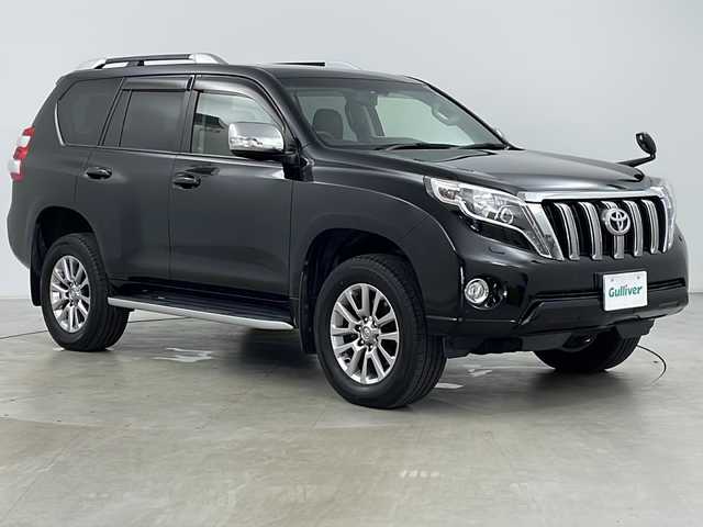 トヨタ ランドクルーザー プラド TX Lパッケージ・G－フロンティア 道央・札幌 2016(平28)年 6.7万km ブラック ・純正ナビ&DVD&CD&BT/・バックカメラ/・クルーズコントロール/・横滑り防止装置/・ＤＡＣ/・DPF(排出ガス浄化装置)/・アイドルアップ/・前席パワーシート&ヒーター/・ETC/・レザーシート/・３列目電動格納シート/・ルーフレール/・リアスポイラー/・電動格納ミラー/・純正フロアマット/・プッシュスタート/・ＬＥＤヘッドライト/・オートライト/・スマートキー