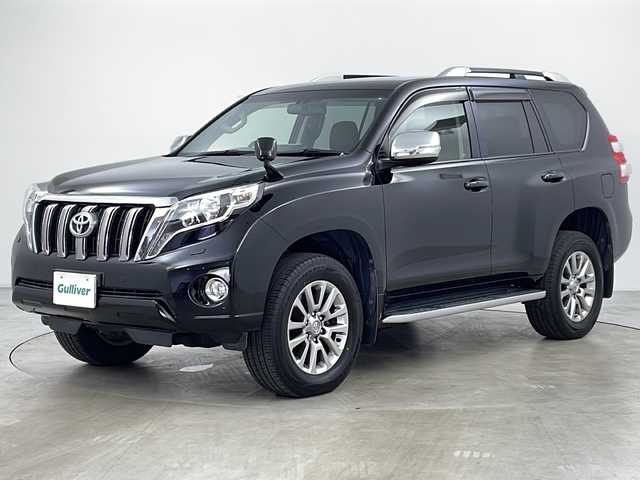 トヨタ ランドクルーザー プラド TX Lパッケージ・G－フロンティア 道央・札幌 2016(平28)年 6.7万km ブラック ・純正ナビ&DVD&CD&BT/・バックカメラ/・クルーズコントロール/・横滑り防止装置/・ＤＡＣ/・DPF(排出ガス浄化装置)/・アイドルアップ/・前席パワーシート&ヒーター/・ETC/・レザーシート/・３列目電動格納シート/・ルーフレール/・リアスポイラー/・電動格納ミラー/・純正フロアマット/・プッシュスタート/・ＬＥＤヘッドライト/・オートライト/・スマートキー