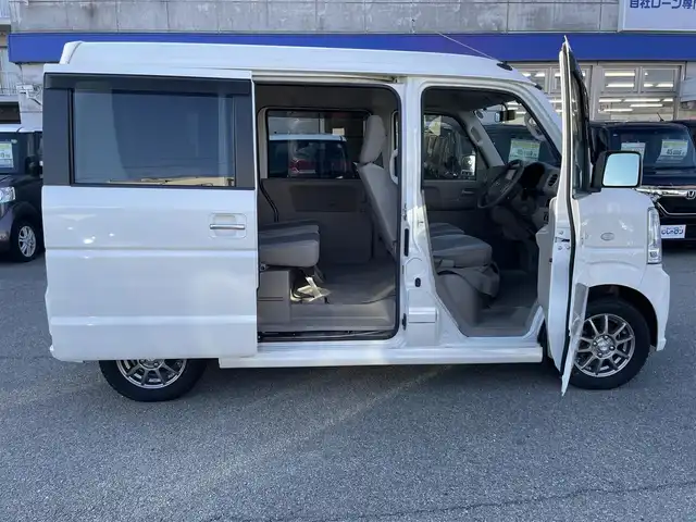 日産 ＮＶ１００クリッパー リオ G 兵庫県 2014(平26)年 6.5万km スノーパールホワイト 社外7インチSDナビゲーション(AVN-SZ04i)/フルセグ BT CD DVD/ターボ/4WD/両側パワースライドドア/左オートステップ/D席シートヒーター/フォグライト/ETC/電動格納ミラー/ドアバイザー/純正フロアマット/ISOFIX/スタッドレスタイヤ/社外13インチアルミホイール/リモコンキー