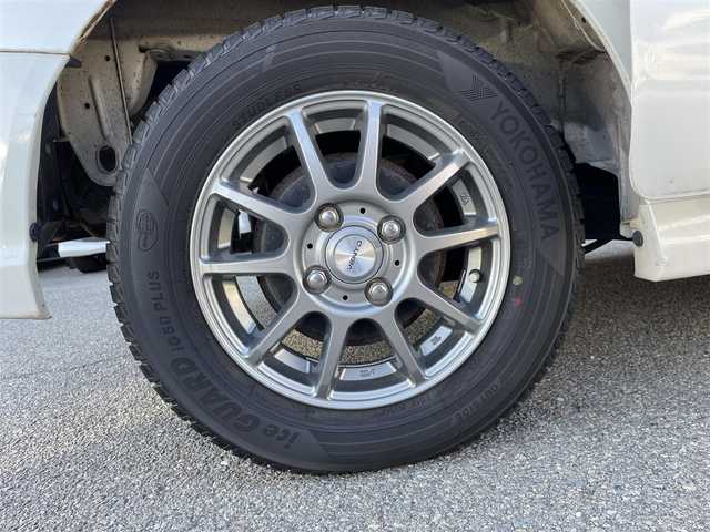 日産 ＮＶ１００クリッパー リオ G 兵庫県 2014(平26)年 6.5万km スノーパールホワイト 社外7インチSDナビゲーション(AVN-SZ04i)/フルセグ BT CD DVD/ターボ/4WD/両側パワースライドドア/左オートステップ/D席シートヒーター/フォグライト/ETC/電動格納ミラー/ドアバイザー/純正フロアマット/ISOFIX/スタッドレスタイヤ/社外13インチアルミホイール/リモコンキー