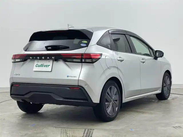 日産 ノート X 岡山県 2021(令3)年 2万km ブリリアントシルバー 純正9インチナビ/・CarPlay/Bluetooth/フルセグTV/HDMI/アラウンドビューモニター/デジタルインナーミラー/ワイヤレス充電/ETC/ドライブレコーダー（前）/LEDヘッドライト/エマージェンシーブレーキ/車線逸脱警報/コーナーセンサー/オートハイビーム/オートライト/ブラインドスポットモニター/オートブレーキホールド/電動パーキング/ドアバイザー/純正フロアマット/新車保証書/取扱説明書/スペアキー×１