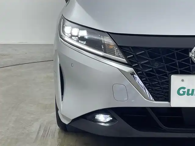 日産 ノート X 岡山県 2021(令3)年 2万km ブリリアントシルバー 純正9インチナビ/・CarPlay/Bluetooth/フルセグTV/HDMI/アラウンドビューモニター/デジタルインナーミラー/ワイヤレス充電/ETC/ドライブレコーダー（前）/LEDヘッドライト/エマージェンシーブレーキ/車線逸脱警報/コーナーセンサー/オートハイビーム/オートライト/ブラインドスポットモニター/オートブレーキホールド/電動パーキング/ドアバイザー/純正フロアマット/新車保証書/取扱説明書/スペアキー×１