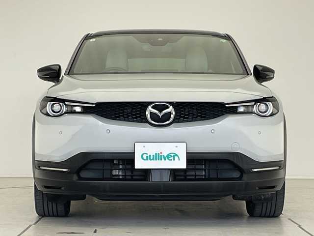 マツダ ＭＸ－３０ＥＶモデル ハイエストセット 愛知県 2021(令3)年 4.5万km セラミックメタリック プレミアムサウンドBOSE/純正10型ナビ　SDカードなし/全方位カメラ/レーダークルーズコントロール/シートヒーター/バックカメラ/パワーシート/ヘッドアップディスプレイ/コーナーセンサー/純正アルミホイール/ブラインドスポットモニター/LEDヘッドライト/パドルシフト/ステアリングヒーター/オートマチックハイビーム/ETC/衝突軽減システム/フルセグ/Bluetooth/ステアリングスイッチ/スマートキー/プッシュスタート