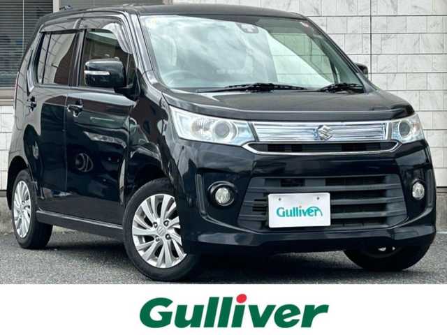 スズキ ワゴンＲ スティングレー X 福岡県 2014(平26)年 6.4万km ブルーイッシュブラックパール3 社外メモリナビ【NX614】/　（AM/FM/CD/DVD/MUSICCATCHER/Bluetooth/フルセグTV）　/バックカメラ/スズキセーフティサポート/・レーダーブレーキサポート/・誤発進抑制機能/・エマージェンシーストップシグナル/アイドリングストップ/横滑り防止装置/純正14インチアルミホイール/シートヒーター（D席）/ビルトインETC/COMTEC製インナーミラー【ZERO53M】/純正フロアマット/ISOFIX/ドアバイザー/電格ウインカーミラー/電源ソケット×1/スペアキー×1/保証書/取扱説明書