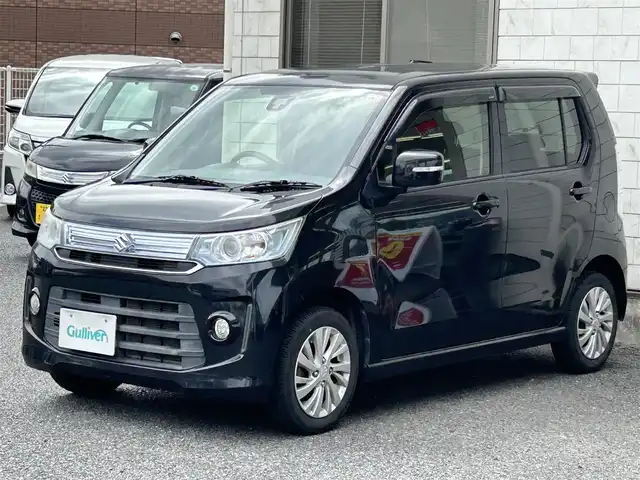 スズキ ワゴンＲ スティングレー X 福岡県 2014(平26)年 6.4万km ブルーイッシュブラックパール3 社外メモリナビ【NX614】/　（AM/FM/CD/DVD/MUSICCATCHER/Bluetooth/フルセグTV）　/バックカメラ/スズキセーフティサポート/・レーダーブレーキサポート/・誤発進抑制機能/・エマージェンシーストップシグナル/アイドリングストップ/横滑り防止装置/純正14インチアルミホイール/シートヒーター（D席）/ビルトインETC/COMTEC製インナーミラー【ZERO53M】/純正フロアマット/ISOFIX/ドアバイザー/電格ウインカーミラー/電源ソケット×1/スペアキー×1/保証書/取扱説明書
