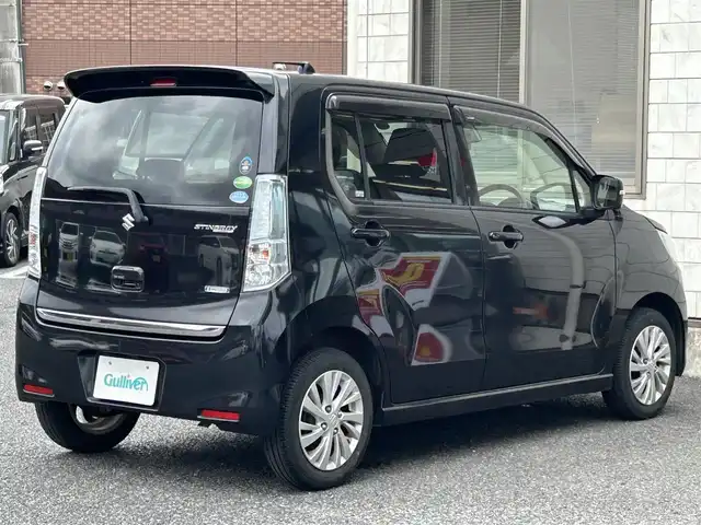 スズキ ワゴンＲ スティングレー X 福岡県 2014(平26)年 6.4万km ブルーイッシュブラックパール3 社外メモリナビ【NX614】/　（AM/FM/CD/DVD/MUSICCATCHER/Bluetooth/フルセグTV）　/バックカメラ/スズキセーフティサポート/・レーダーブレーキサポート/・誤発進抑制機能/・エマージェンシーストップシグナル/アイドリングストップ/横滑り防止装置/純正14インチアルミホイール/シートヒーター（D席）/ビルトインETC/COMTEC製インナーミラー【ZERO53M】/純正フロアマット/ISOFIX/ドアバイザー/電格ウインカーミラー/電源ソケット×1/スペアキー×1/保証書/取扱説明書