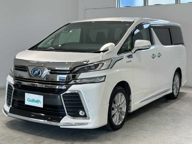 トヨタ ヴェルファイア ハイブリット ZR 宮城県 2015(平27)年 5.1万km ホワイトパールクリスタルシャイン モデリスタエアロ/JBLサウンド/４WD/純正ナビ/【CD/DVD/フルセグ.BT.SD.FM/AM】/フリップダウンモニター/バックカメラ/ETC/両側パワースライドドア/ハーフレザーシート/パワーバックドア/クルーズコントロール/前席パワーシート/LEDヘッドライト/フォグライト/横滑り防止/本革巻きステアリング/ステアリングスイッチ/コーナーセンサー
