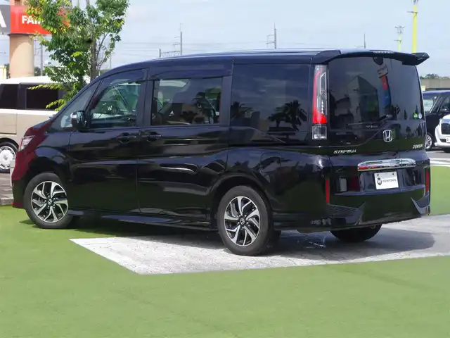ホンダ ステップワゴン スパーダ ホンダセンシング 大阪府 2020(令2)年 4.5万km プレミアムスパークルブラックパール ホンダセンシング/・衝突軽減ブレーキ（CMBS）/・車線維持支援システム（LKAS）/・アダプティブクルーズコントロール（ACC）/・後方誤発進抑制機能/・誤発進抑制機能/両側パワースライドドア/純正メモリーナビ/地デジTV/【DVD/CD再生機能　Bluetooth接続】/バックカメラ/革巻きステアリング/パドルシフト/ドライブレコーダー（前後撮影）/フリップダウンモニター/ETC（2.0）/LEDヘッドライト/ウインカーミラー/純正16インチアルミホイル/Honda スマートキー