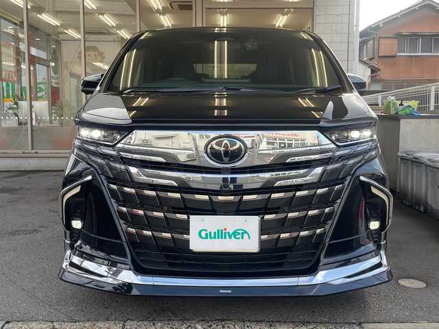 トヨタ アルファード Z 愛知県 2023(令5)年 1.2万km ブラック /当店買取/法人1オーナー/禁煙//ナビ機能付14インチディスプレイオーディオ///フルセグTV/Bluetooth/Miracast//typeC/HDMI/AppleCarplay//純正13.2型有機EL後席ディスプレイ//360度カメラ/ヘッドアップディスプレイ//黒革シート/パワーシート/シートヒーター/エアーシート//モデリスタエアロ/モデリスタマフラー//モデリスタシグネチャーイルミブレード//3眼LEDヘッド/Aライト/AHB/LEDフォグ//シーケンシャルウィンカー//左右独立ムーンルーフ//トヨタチームメイト///アドバンスドドライブ/レーダークルーズコントロール//PCS/LDA/PDA/RSA/レーンチェンジアシスト/BSM//リヤフロントクロストラフィックアラート/Pソナー//PKSB/リヤカメラディテクション/安心降車アシスト//ビルトインETC/100V100Wコンセント//パワーゲート/両側Pスライドドア//ユニバーサルステップ/デジタルインナーミラー//パンク修理キット/3列目ヘッドレスト車載//保証書/取説/スペアキー/スマートキー