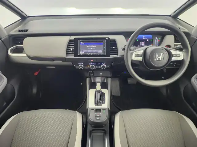 ホンダ フィット e:HEVクロスター 愛知県 2020(令2)年 5.7万km クリスタルブラックパール ホンダセンシング/　　・衝突軽減ブレーキシステム/　　・路外逸脱抑制機能/　　・アダプティブクルーズコントロール/　　・車線維持支援システム/　　・オートハイビーム/純正7インチナビ/USBポート/バックカメラ/ドライブレコーダー/ビルトインETC/革巻きステアリング/ステアリングリモコン/純正LEDヘッドライト/純正16インチアルミホイール/取扱説明書/保証書/スペアキー