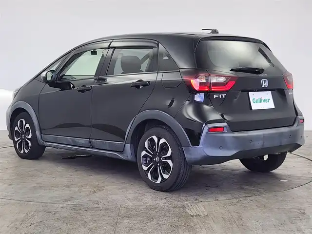 ホンダ フィット e:HEVクロスター 愛知県 2020(令2)年 5.7万km クリスタルブラックパール ホンダセンシング/　　・衝突軽減ブレーキシステム/　　・路外逸脱抑制機能/　　・アダプティブクルーズコントロール/　　・車線維持支援システム/　　・オートハイビーム/純正7インチナビ/USBポート/バックカメラ/ドライブレコーダー/ビルトインETC/革巻きステアリング/ステアリングリモコン/純正LEDヘッドライト/純正16インチアルミホイール/取扱説明書/保証書/スペアキー