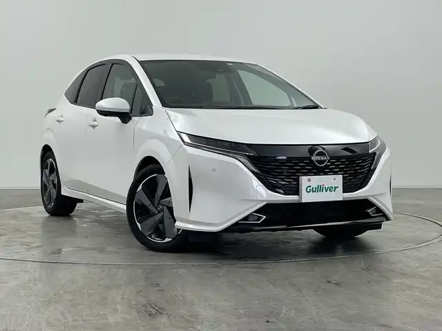 日産 オーラ G レザーエディション 群馬県 2023(令5)年 0.5万km ピュアホワイトパール プロパイロット エマージェンシーブレーキ　純正ナビ　フルセグ　全方位カメラ　BOSEサウンド　ブラインドスポットモニター　デジタルインナーミラー　置くだけ充電　スマートキー　ETC LEDオートライト
