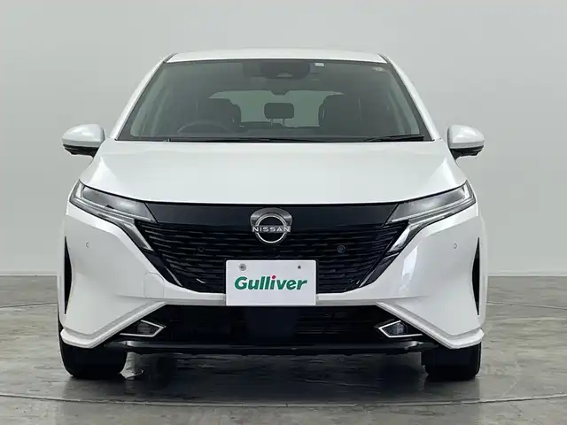 日産 オーラ G レザーエディション 群馬県 2023(令5)年 0.5万km ピュアホワイトパール プロパイロット エマージェンシーブレーキ　純正ナビ　フルセグ　全方位カメラ　BOSEサウンド　ブラインドスポットモニター　デジタルインナーミラー　置くだけ充電　スマートキー　ETC LEDオートライト