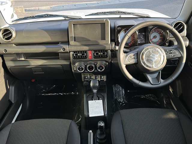 スズキ ジムニー ノマド FC 香川県 2025(令7)年 0.1千km アークティックホワイトパール シートヒーター（D+N席)/背面タイヤ/純正アルミホイール/前後コーナーセンサー/アイドリングストップ/オートライト/LEDヘッドライト/ワンオーナー/４WD/スマートキー