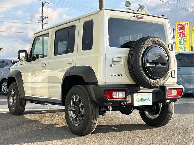 スズキ ジムニー ノマド FC 香川県 2025(令7)年 0.1千km アークティックホワイトパール シートヒーター（D+N席)/背面タイヤ/純正アルミホイール/前後コーナーセンサー/アイドリングストップ/オートライト/LEDヘッドライト/ワンオーナー/４WD/スマートキー
