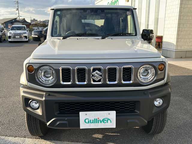 スズキ ジムニー ノマド FC 香川県 2025(令7)年 0.1千km アークティックホワイトパール シートヒーター（D+N席)/背面タイヤ/純正アルミホイール/前後コーナーセンサー/アイドリングストップ/オートライト/LEDヘッドライト/ワンオーナー/４WD/スマートキー