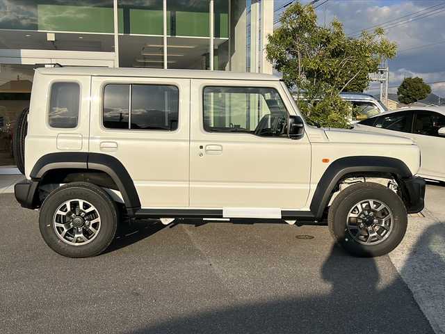 スズキ ジムニー ノマド FC 香川県 2025(令7)年 0.1千km アークティックホワイトパール シートヒーター（D+N席)/背面タイヤ/純正アルミホイール/前後コーナーセンサー/アイドリングストップ/オートライト/LEDヘッドライト/ワンオーナー/４WD/スマートキー