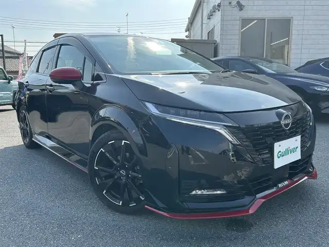 日産 オーラ ニスモ 奈良県 2022(令4)年 1.3万km スーパーブラック エンジンスタートボタン/パワーステアリング/パワーウィンドウ/アイドリングストップ/スマートキー/スペアキー１本/オートエアコン/USB入力端子/全方位カメラ/純正フロアマット/純正アルミホイール/D席N席シートヒーター/ABS/横滑り防止装置/コーナーセンサー前後/オートライト/オートマチックハイビーム/W+サイドエアバック/ステアリングヒーター