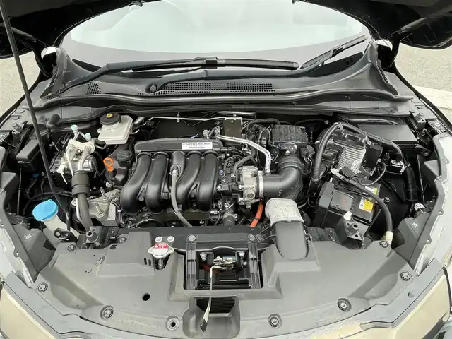 ホンダ ヴェゼル ハイブリッド RS ホンダセンシング 群馬県 2019(令1)年 6.8万km クリスタルブラックパール 純正９インチナビ　/フルセグＴＶ・Ｂｌｕｅｔｏｏｔｈ・ＣＤ・ＤＶＤ　/バックカメラ　/シートヒーター　/黒ハーフレザー　/パドルシフト　/ハンドル支援/アダプティブクルーズコントロール　/衝突軽減ブレーキ　/レーンアシスト　/オートワイパー　/純正AW