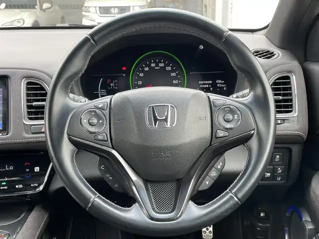 ホンダ ヴェゼル ハイブリッド RS ホンダセンシング 群馬県 2019(令1)年 6.8万km クリスタルブラックパール 純正９インチナビ　/フルセグＴＶ・Ｂｌｕｅｔｏｏｔｈ・ＣＤ・ＤＶＤ　/バックカメラ　/シートヒーター　/黒ハーフレザー　/パドルシフト　/ハンドル支援/アダプティブクルーズコントロール　/衝突軽減ブレーキ　/レーンアシスト　/オートワイパー　/純正AW