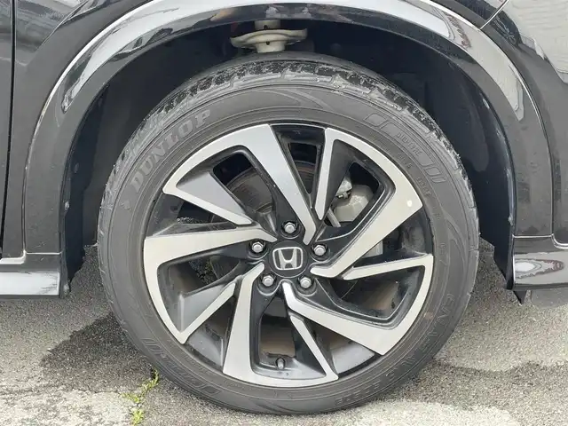 ホンダ ヴェゼル ハイブリッド RS ホンダセンシング 群馬県 2019(令1)年 6.8万km クリスタルブラックパール 純正９インチナビ　/フルセグＴＶ・Ｂｌｕｅｔｏｏｔｈ・ＣＤ・ＤＶＤ　/バックカメラ　/シートヒーター　/黒ハーフレザー　/パドルシフト　/ハンドル支援/アダプティブクルーズコントロール　/衝突軽減ブレーキ　/レーンアシスト　/オートワイパー　/純正AW