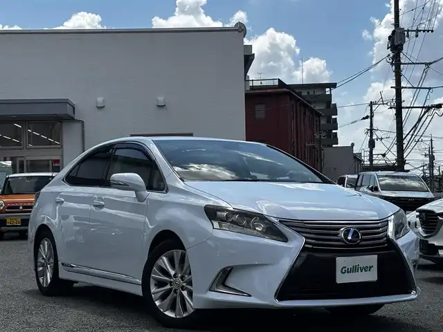 レクサス ＨＳ 250h バージョンI 熊本県 2013(平25)年 10.7万km クォーツホワイトクリスタルシャイン ワンオーナー/純正メーカーナビ/【フルセグTV/CD/DVD/BT】/バックカメラ/クルーズコントロール/衝突被害軽減ブレーキ/ビルトインETC/ベージュ革シート/前席パワーシート/前席シートヒーター /エアーシート/純正17インチAW/オートLEDヘッドライト/リア電動サンシェード/ドライブレコーダー/純正フロアマット