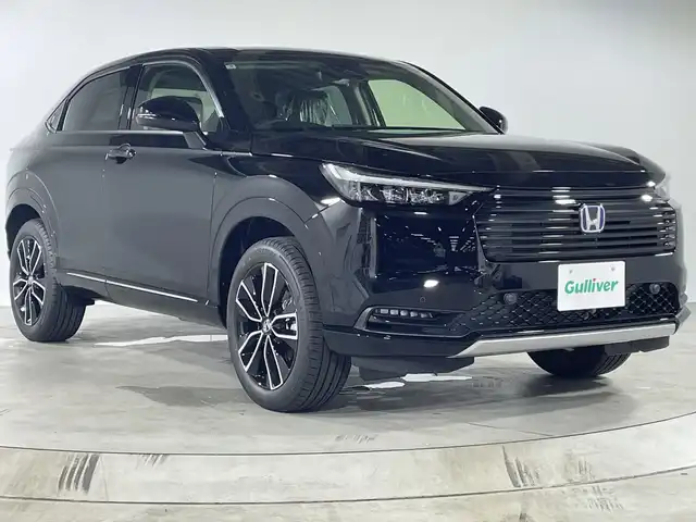 ホンダ ヴェゼル ハイブリッド e:HEV Z 福岡県 2025(令7)年 0.1千km クリスタルブラックパール ・Honda CONNECTディスプレーナビ/・フルセグ/・Bluetooth/・バックカメラ/・ホンダセンシング/・ハンドルヒーター/・パドルシフト/・置くだけ充電/・パワーバックドア/・ハーフレザーシート/・D/Nシートヒーター/・ビルディセントコントロール/・オートライト/・フォグライト/・電格ミラー/・ウィンカーミラー