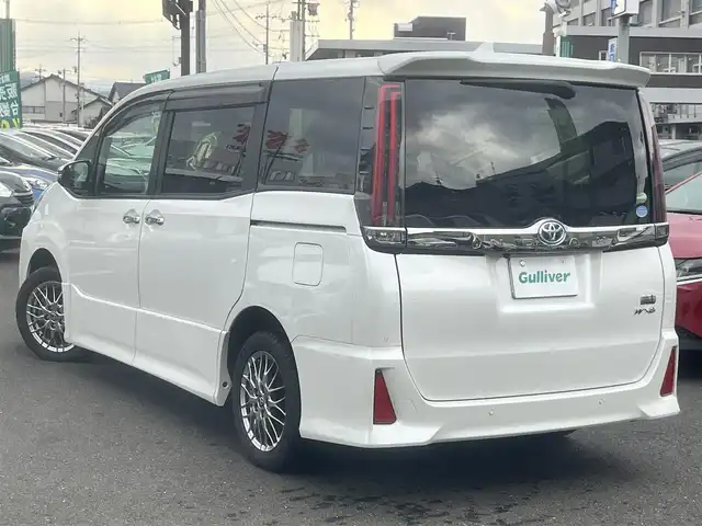 トヨタ ノア ハイブリッド Si ダブルバイビーⅢ 島根県 2021(令3)年 7.3万km ホワイトパールクリスタルシャイン 純正１０インチSDナビ　/(AM/FM/フルセグTVＤＶＤ再生/Ｂｌｕｅｔｏｏｔｈ接続)　/ビルトインＥＴＣ　/バックカメラ/両側パワースライドドア　/クルーズコントロール/前後コーナーセンサー　/レーンアシスト　/プリクラッシュセーフティ　/前席シートヒーター　/オートハイビーム／ライト　/純正ＬＥＤヘッドライト/純正16インチアルミホイール/純正フロアマット