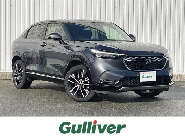 ホンダ ヴェゼル ハイブリッド e:HEV Z 福岡県 2022(令4)年 4万km メテオロイドグレーメタリック ホンダセンシング/CMBS/路外逸脱抑制機能/純正ナビ/フルセグ/BT/AM/FM/USB/applecarplay/androidauto/バックカメラ/アダプティブクルーズコントロール/ハンズフリーパワーバックドア/ＢＳＩ/パドルシフト/ステアリングヒーター/シートヒーター/ＥＴＣ２．０/純正アルミ/ハーフレザー