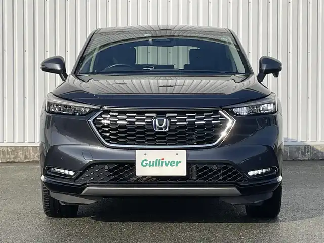 ホンダ ヴェゼル ハイブリッド e:HEV Z 福岡県 2022(令4)年 4万km メテオロイドグレーメタリック ホンダセンシング/CMBS/路外逸脱抑制機能/純正ナビ/フルセグ/BT/AM/FM/USB/applecarplay/androidauto/バックカメラ/アダプティブクルーズコントロール/ハンズフリーパワーバックドア/ＢＳＩ/パドルシフト/ステアリングヒーター/シートヒーター/ＥＴＣ２．０/純正アルミ/ハーフレザー