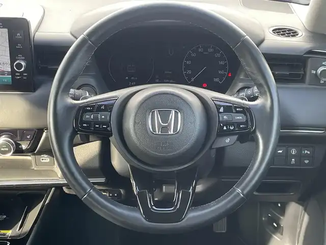 ホンダ ヴェゼル ハイブリッド e:HEV Z 福岡県 2022(令4)年 4万km メテオロイドグレーメタリック ホンダセンシング/CMBS/路外逸脱抑制機能/純正ナビ/フルセグ/BT/AM/FM/USB/applecarplay/androidauto/バックカメラ/アダプティブクルーズコントロール/ハンズフリーパワーバックドア/ＢＳＩ/パドルシフト/ステアリングヒーター/シートヒーター/ＥＴＣ２．０/純正アルミ/ハーフレザー