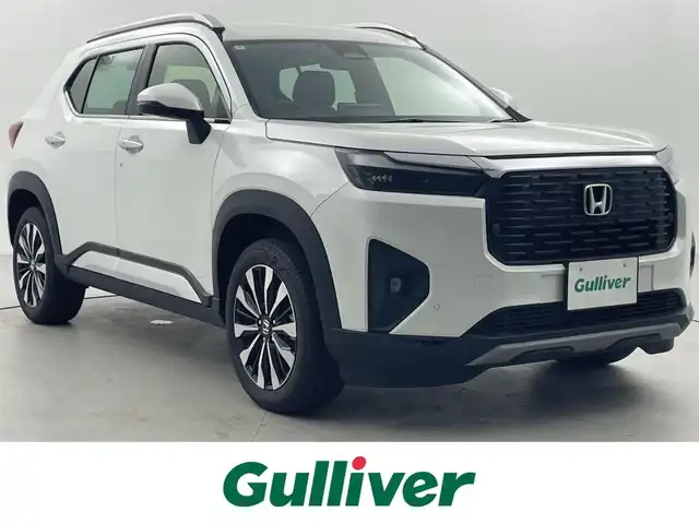 ホンダ ＷＲ－Ｖ Z+ 福井県 2024(令6)年 0.3万km プラチナホワイトパール 純正8型ナビ/(FM/AM/フルセグTV/Bluetooth）　/バックカメラ　/Honda SENSING　/-CMBS　衝突軽減ブレーキ　/-ACC　アダプティブクルーズ　/-LKAS　車線維持支援システム　/-前後パーキングセンサーシステム　/-路外逸脱抑制機能　/-標識認識機能　/-オートハイビーム機能　/-先行車発進お知らせ機能　/ルーフレール　/ハーフレザーシート　/オートエアコン/オートライト/LED ヘッドライト＋フロントフォグライト/パドルシフト　/純正17inAW　