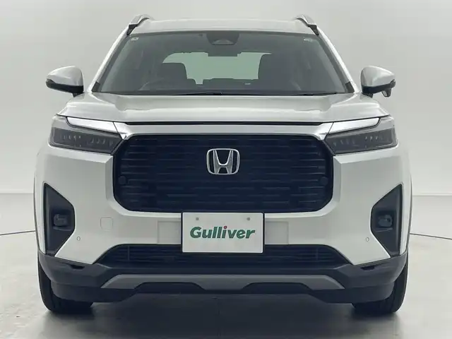 ホンダ ＷＲ－Ｖ Z+ 福井県 2024(令6)年 0.3万km プラチナホワイトパール 純正8型ナビ/(FM/AM/フルセグTV/Bluetooth）　/バックカメラ　/Honda SENSING　/-CMBS　衝突軽減ブレーキ　/-ACC　アダプティブクルーズ　/-LKAS　車線維持支援システム　/-前後パーキングセンサーシステム　/-路外逸脱抑制機能　/-標識認識機能　/-オートハイビーム機能　/-先行車発進お知らせ機能　/ルーフレール　/ハーフレザーシート　/オートエアコン/オートライト/LED ヘッドライト＋フロントフォグライト/パドルシフト　/純正17inAW　
