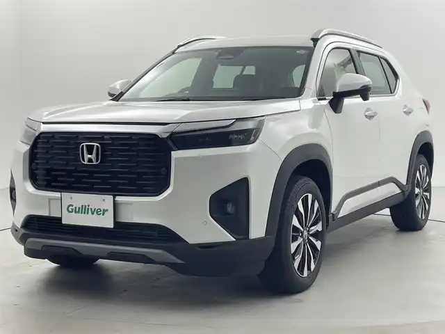 ホンダ ＷＲ－Ｖ Z+ 福井県 2024(令6)年 0.3万km プラチナホワイトパール 純正8型ナビ/(FM/AM/フルセグTV/Bluetooth）　/バックカメラ　/Honda SENSING　/-CMBS　衝突軽減ブレーキ　/-ACC　アダプティブクルーズ　/-LKAS　車線維持支援システム　/-前後パーキングセンサーシステム　/-路外逸脱抑制機能　/-標識認識機能　/-オートハイビーム機能　/-先行車発進お知らせ機能　/ルーフレール　/ハーフレザーシート　/オートエアコン/オートライト/LED ヘッドライト＋フロントフォグライト/パドルシフト　/純正17inAW　