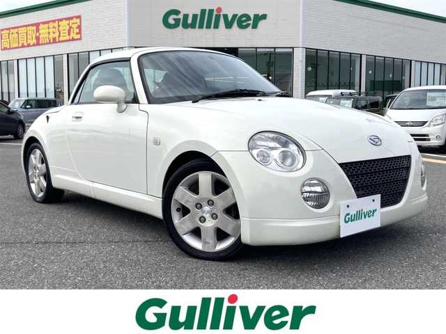 ダイハツ コペン アクティブトップ 鳥取県 2004(平16)年 7.1万km ホワイトパールマイカ ターボ車/電動オープン/社外CDオーディオ/キセノンライト/フォグライト/純正15インチアルミホイール/電動ミラー/キーレスキー/MTモード付きAT/トランクスポイラー/フロアマット