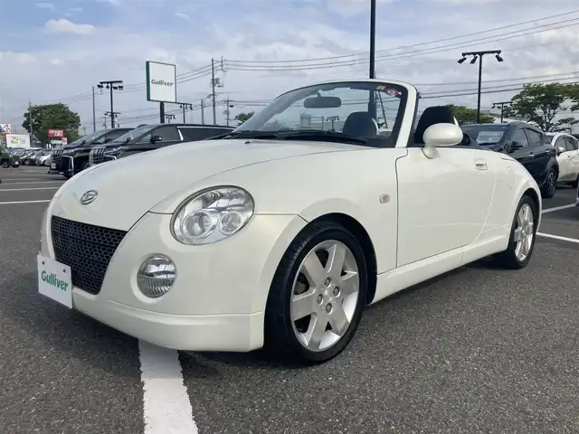 ダイハツ コペン アクティブトップ 鳥取県 2004(平16)年 7.1万km ホワイトパールマイカ ターボ車/電動オープン/社外CDオーディオ/キセノンライト/フォグライト/純正15インチアルミホイール/電動ミラー/キーレスキー/MTモード付きAT/トランクスポイラー/フロアマット