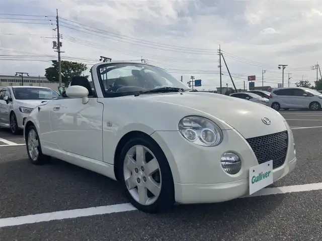 ダイハツ コペン アクティブトップ 鳥取県 2004(平16)年 7.1万km ホワイトパールマイカ ターボ車/電動オープン/社外CDオーディオ/キセノンライト/フォグライト/純正15インチアルミホイール/電動ミラー/キーレスキー/MTモード付きAT/トランクスポイラー/フロアマット