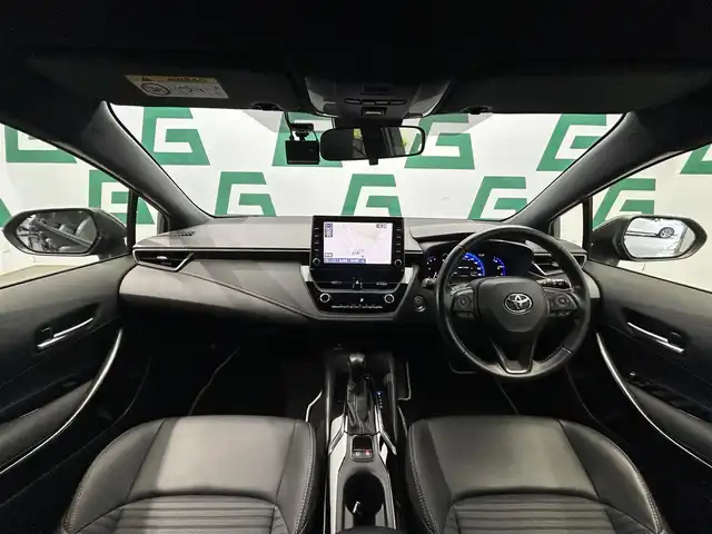 トヨタ カローラツーリング ハイブリッド ダブルバイビー 鹿児島県 2020(令2)年 5.7万km スパークリングブラックパールクリスタルシャイン 純正ディスプレイオーディオ（ナビ機能付）　/バックカメラ　/ブラインドスポットモニター　/革巻きステアリング　/ステアリングヒーター　/オールオートウィンドウ　/電動パーキングブレーキ　/オートブレーキホールド