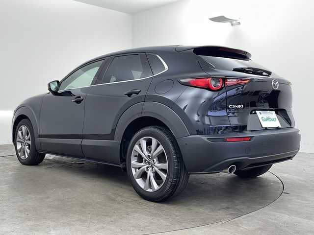 マツダ ＣＸ－３０ XD Lパッケージ 兵庫県 2020(令2)年 2.8万km ジェットブラックマイカ ・純正ナビ/CD/DVD/BT/TV/・i-ACTIVSENSE/・衝突軽減システム/・横滑り防止装置/・レーダークルーズコントロール/・アイドリングストップ/・ビルトインETC/・前後ドライブレコーダー/・前後コーナーセンサー/・アラウンドビューモニター/・パワーバックドア/・レザーシート/・パワーシート（運転席）/・メモリーシート（運転席）/・シートヒーター（運転席＋助手席）/・革巻きステアリング/・ステアリングリモコン/・ステアリングヒーター/・電動パーキングブレーキ/・オートホールド/・LEDオートライト/・オートマチックハイビーム/・電動リアゲート/・MTモード付AT/・純正フロアマット/・純正１８インチアルミホイール/・スマートキー/・プッシュスタート/・W＋サイドエアバッグ/・カーテンエアバッグ
