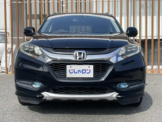 ホンダ ヴェゼル ハイブリッド Z 千葉県 2014(平26)年 10.4万km クリスタルブラックパール (株)IDOMが運営する【じしゃロン八千代店】の自社ローン対象車両になります。こちらは現金またはオートローンご利用時の価格です。自社ローンご希望の方は別途その旨お申付け下さい/純正ナビ（CD・DVD・BT接続可）/フルセグテレビ/ETC/バックカメラ/シートヒーター（D席・N席）/LEDヘッドライト/純正フロアマット
