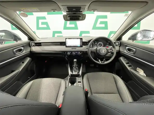 ホンダ ヴェゼル ハイブリッド e:HEV Z 鹿児島県 2025(令7)年 0.1千km クリスタルブラックパール Honda CONNECTディスプレー/ホンダセンシング/ワイヤレス充電器/バックカメラ/ブラインドスポットモニター/アダプティブドライビングビーム/後退出庫サポート/ブレーキホールド/横滑り防止装置/前後コーナーセンサー/パワーテールゲート/チップアップシート/運転席・助手席シートヒーター/本革巻きステアリング/ETC/禁煙車