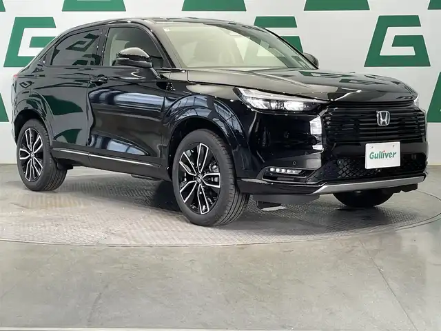 ホンダ ヴェゼル ハイブリッド e:HEV Z 鹿児島県 2025(令7)年 0.1千km クリスタルブラックパール Honda CONNECTディスプレー/ホンダセンシング/ワイヤレス充電器/バックカメラ/ブラインドスポットモニター/アダプティブドライビングビーム/後退出庫サポート/ブレーキホールド/横滑り防止装置/前後コーナーセンサー/パワーテールゲート/チップアップシート/運転席・助手席シートヒーター/本革巻きステアリング/ETC/禁煙車
