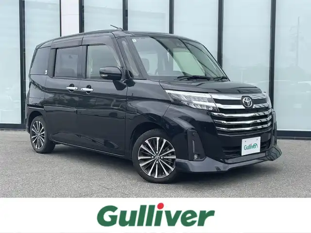 トヨタ ルーミー カスタムG－T 大阪府 2022(令4)年 2.9万km ブラックマイカメタリック 純正９インチナビ　/   フルセグTV/CD/DVD/Bluetooth　/パノラミックビューモニター/スマートアシスト/フロントコーナーセンサー　　/前席シートヒーター　/両側パワースライドドア　/レーダークルーズコントロール/レーンキープアシスト　/アイドリングストップ　/前後ドライブレコーダー/純正15インチアルミホイール/ターボ車　/ＥＴＣ　/ＬＥＤ