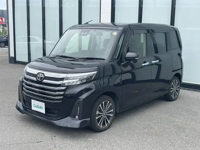 トヨタ ルーミー カスタムG－T 大阪府 2022(令4)年 2.9万km ブラックマイカメタリック 純正９インチナビ　/   フルセグTV/CD/DVD/Bluetooth　/パノラミックビューモニター/スマートアシスト/フロントコーナーセンサー　　/前席シートヒーター　/両側パワースライドドア　/レーダークルーズコントロール/レーンキープアシスト　/アイドリングストップ　/前後ドライブレコーダー/純正15インチアルミホイール/ターボ車　/ＥＴＣ　/ＬＥＤ