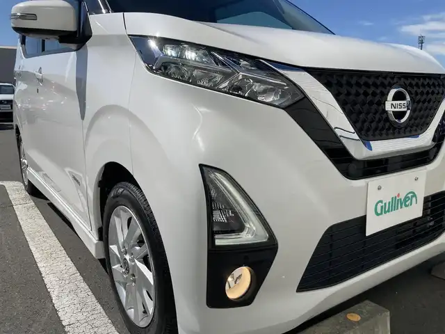日産 デイズ ハイウェイスターX 静岡県 2020(令2)年 3万km ホワイトパール エマージェンシーブレーキ/純正9インチナビ(MM319D-L)/　AM FM CD DVD Bluetooth AUX/LEDオートヘッドランプ/前後方クリアランスソナー/純正14インチアルミホイール/革巻きステアリング/ステアリングスイッチ/スマートキー＆プッシュスタート/パーキングアシスト/アイドリングストップ/フルセグTV/アラウンドビューモニター