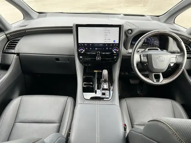 トヨタ アルファードハイブリット Z 鹿児島県 2024(令6)年 2.3万km プラチナホワイトパールマイカ 純正フリップダウンモニター/純正メモリナビ/　　CD/DVD/BT/フルセグ/アラウンドビューモニター/両側パワースライドドア/LEDヘッドライト/レザーシート/純正18インチアルミホイール/純正ビルトインETC2.0/オットマン/電動リアゲート/社外ドライブレコーダー